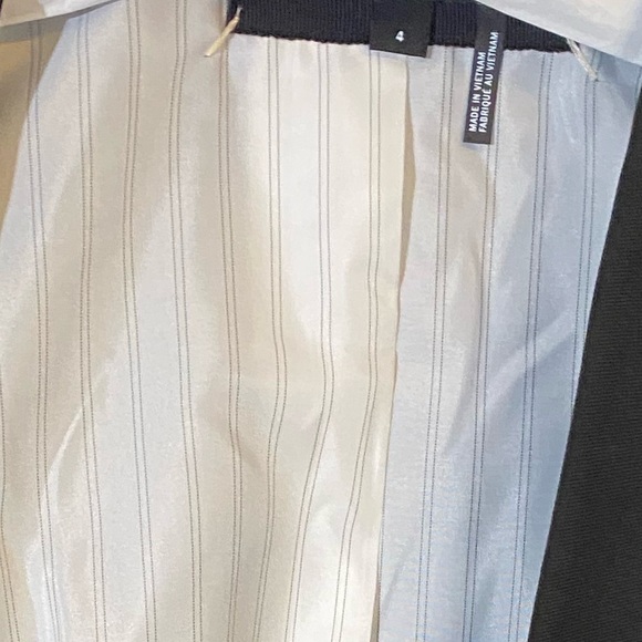 DKNY Double Breasted Vest. Black with Gold Buttons and Gold Logo Embellishments - Picture 11 of 12